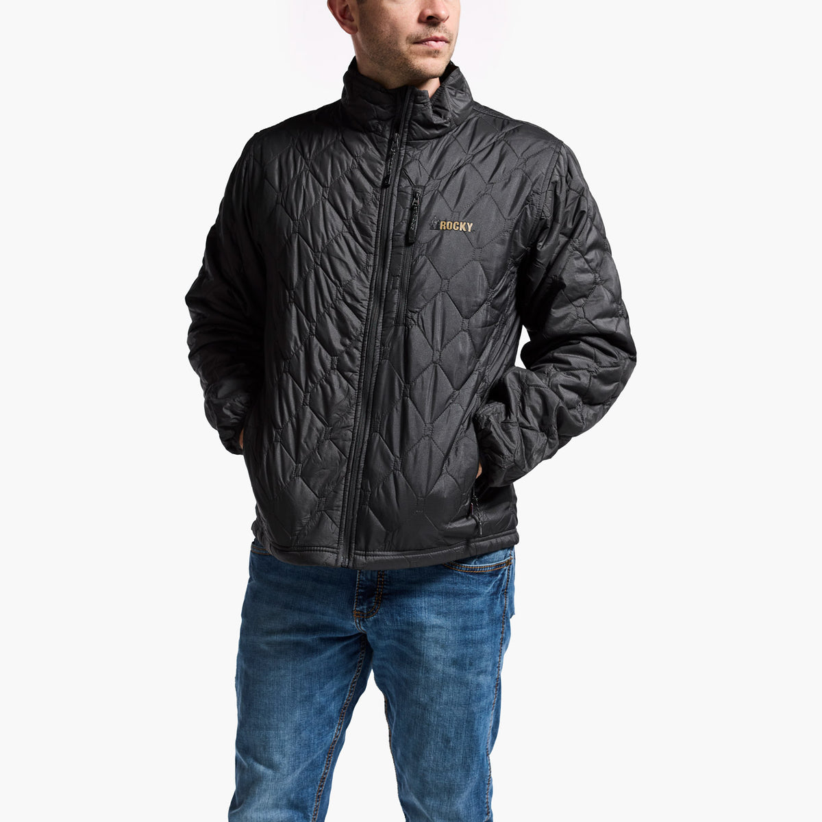 Man wearing a black quilted jacket with a brand logo on a white background