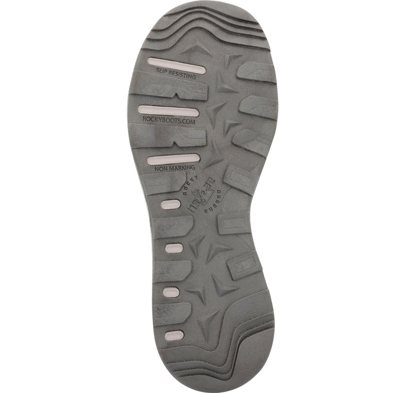 Close-up of a gray boot sole with tread pattern on a white background